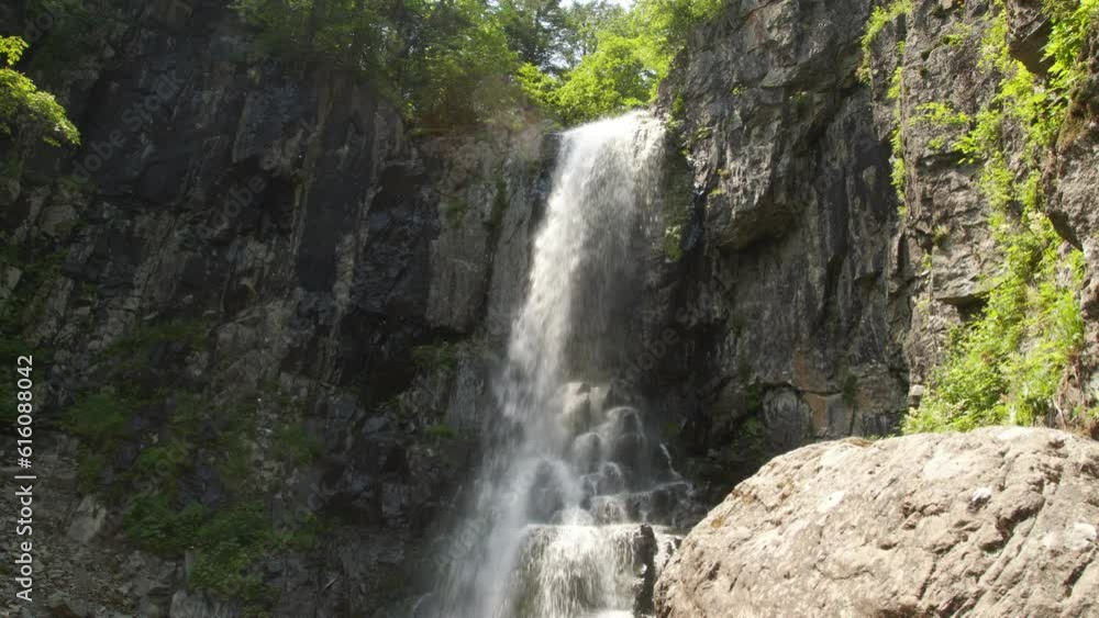 steep cliffs with a waterfall steep cliffs with a waterfall