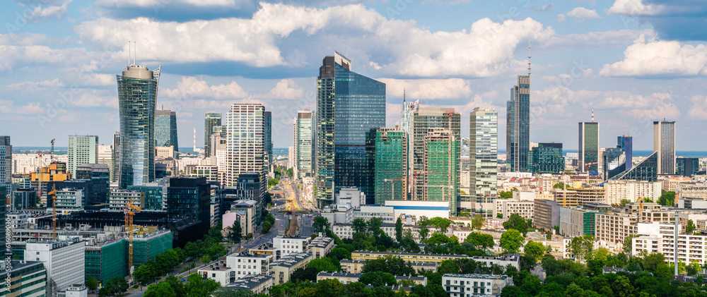Fototapeta premium Warsaw city center aerial landscape, skyscrapers panorama under blue cloudy sky