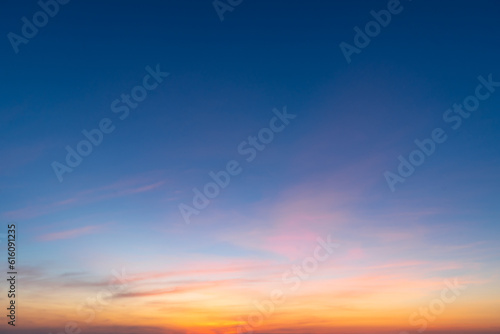 Fototapeta Naklejka Na Ścianę i Meble -  Background of clear blue sky, few clouds at dusk of dawn.