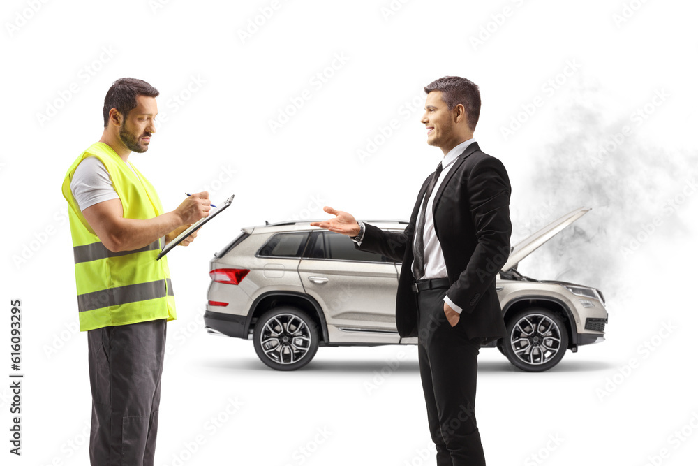 Man explaining a car problem an a road help agent writing down a document