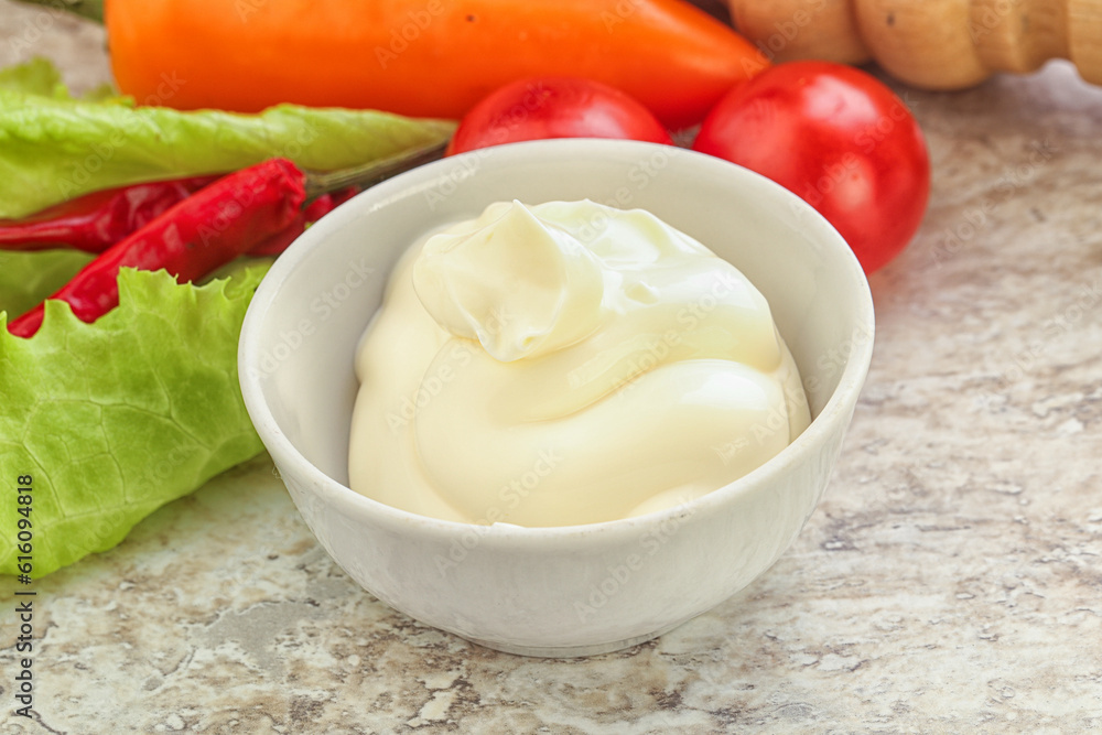 Organic mayonnaise sauce in the bowl Organic mayonnaise sauce in the bowl