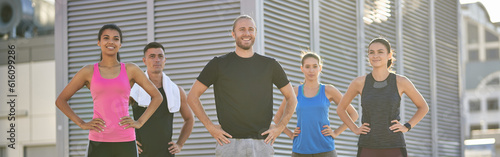 Group of diverse sports people practicing posing in the city