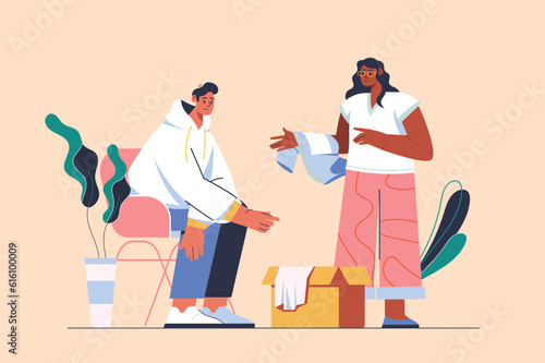 Donation concept with people scene in the flat cartoon design. A young couple collects unwanted clothes to give to people in need. Vector illustration.