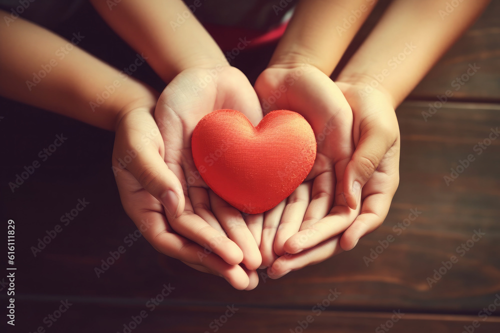 Obraz premium Family holding small red heart in hands on wooden background. Healthcare and hospital medical concept. Symbolic of Valentine day.Top view. Generative AI