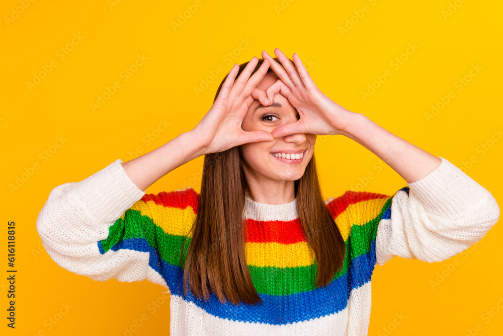 Photo of flirty brunette millennial lady show heart wear pullover isolated on shine color background