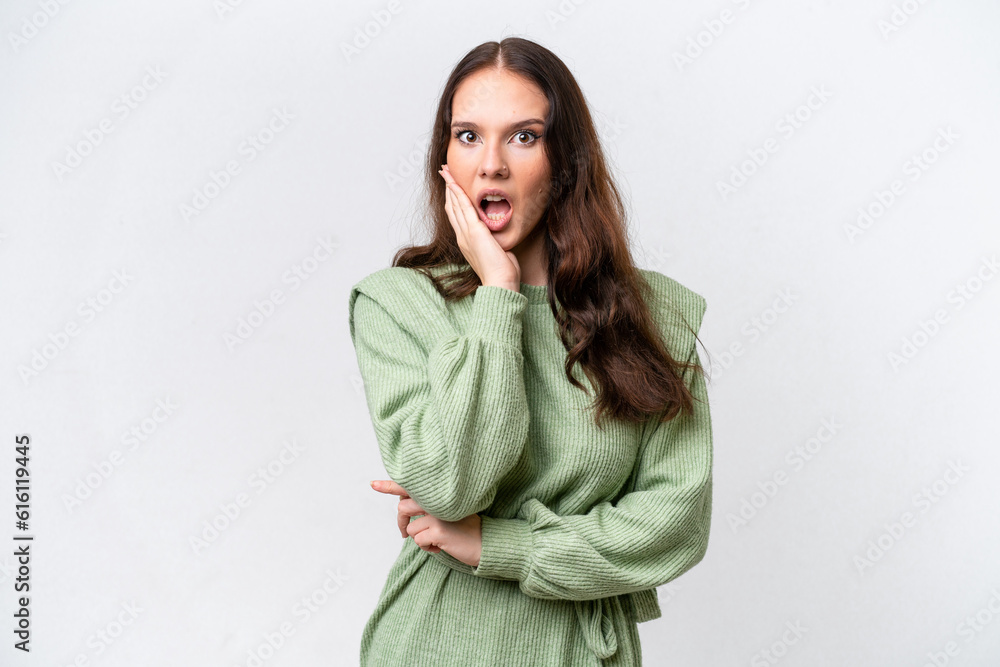 Young caucasian woman isolated on white background surprised and shocked while looking right Young caucasian woman isolated on white background surprised and shocked while looking right