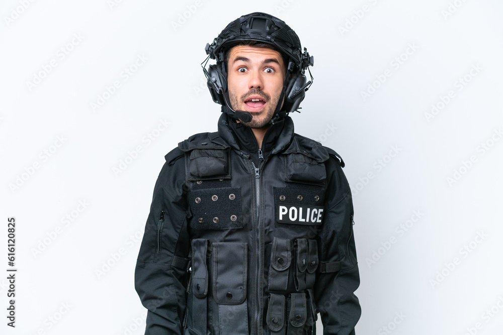 Young caucasian SWAT man isolated on white background with surprise facial expression Young caucasian SWAT man isolated on white background with surprise facial expression