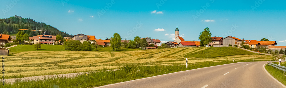Alpine summer view with a curch at Zell, Eisenberg, Ostallgaeu, Bavaria, Germany Alpine summer view with a curch at Zell, Eisenberg, Ostallgaeu, Bavaria, Germany