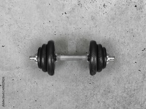 Dumbbells placed on the cement floor top view