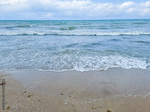 Closeup sea sand beach. Panoramic beach landscape. Inspire tropical beach seascape horizon. calmness tranquil relaxing sunlight summer mood. Vacation travel holiday.Relaxing seascape