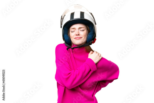 Young pretty woman with a motorcycle helmet over isolated chroma key background suffering from pain in shoulder for having made an effort