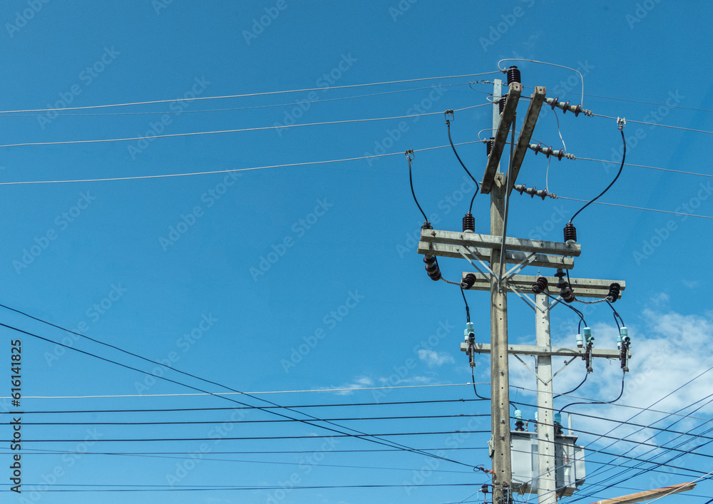 lighting poles and transformers stood tall and sturdy, silently fulfilling their essential roles in illuminating the surroundings and ensuring a steady flow of electricity. These structures, clsoe up.
