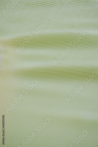 Beautiful blurred color smooth flowing fabric blank background space for text