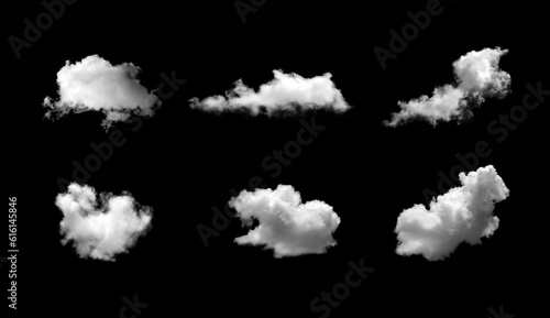 Beautiful white clouds isolated on a black background or black and white haze. In natural summer sky weather gorgeous environment.