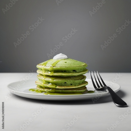 Green  Macha pistachio green tea pancake stack on a white plate