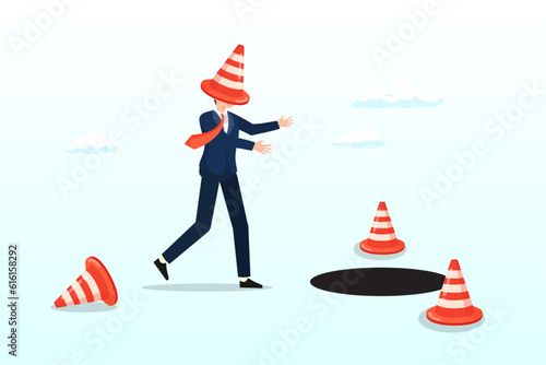 Blindfold businessman cover with pylon walking to fall into the hole or business trap, blind and frustrated business direction, mistake or failure, trap or crisis ahead, risk and uncertainty (Vector)