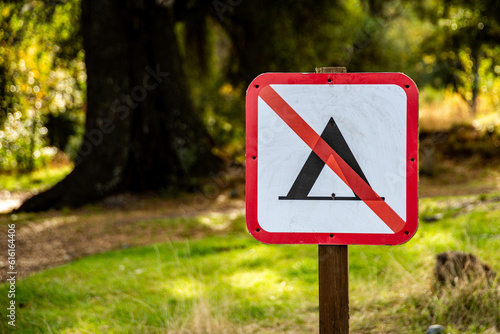 No camping sign with nature background