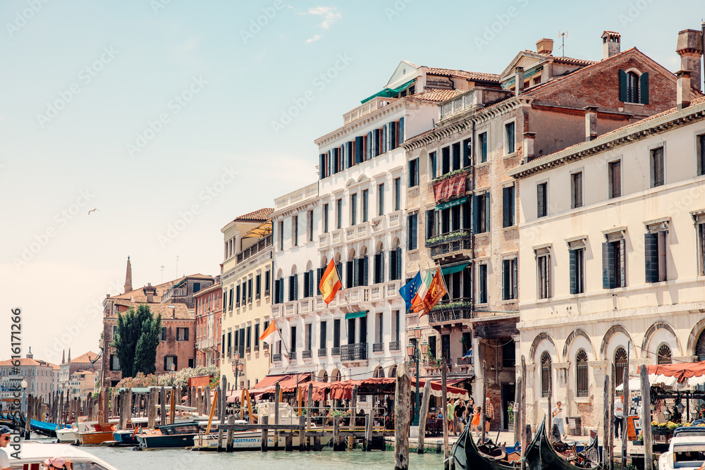 Venice's Canal-Side Buildings with Gondola Stations
