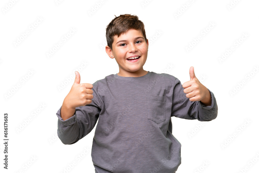 Little caucasian kid over isolated chroma key background giving a thumbs up gesture Little caucasian kid over isolated chroma key background giving a thumbs up gesture