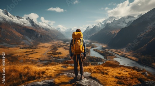 Hiker stands with his backpack on a mountain top looking into the valley of an unknown country, in the style of dark yellow and teal, grandeur of scale, iconic, weathercore