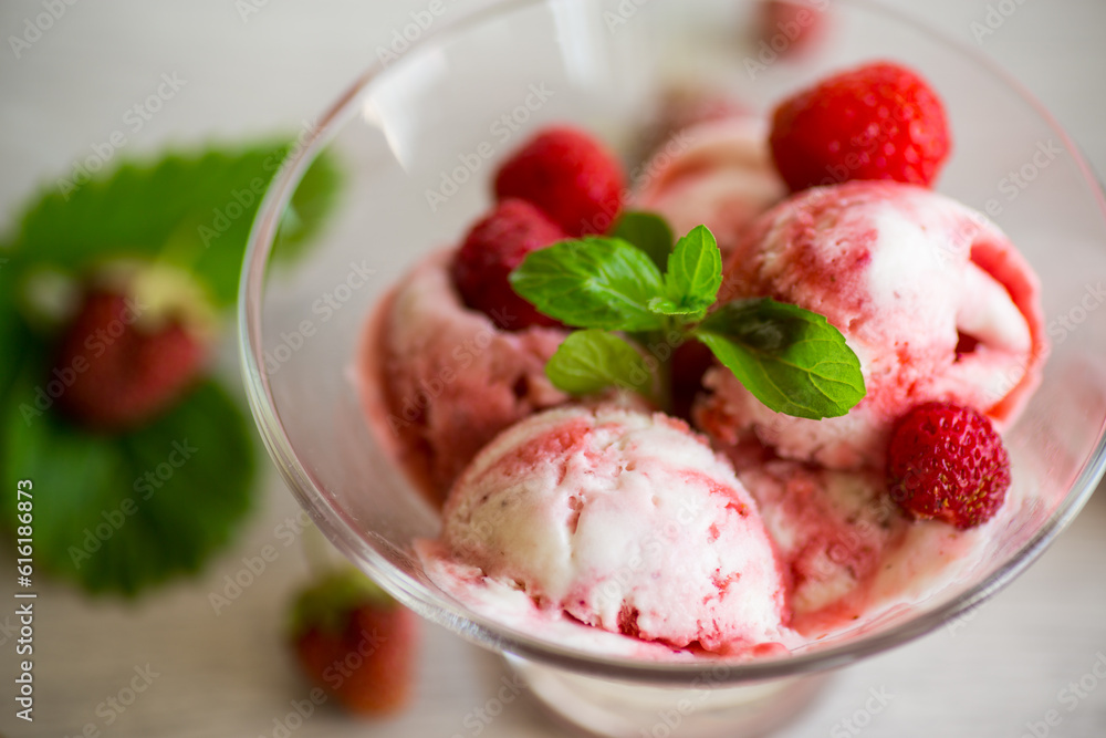 Balls of homemade strawberry ice cream in a bowl Balls of homemade strawberry ice cream in a bowl
