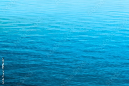 blue water surface texture background gradient color. abstract sea water, clear ocean natural wallpaper