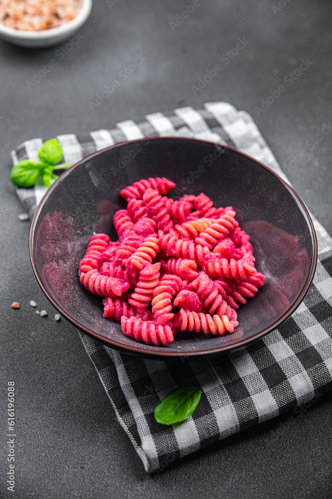 pasta fusilli beet vegetable sauce beetroot second course fresh food vegan meal food snack vegetarian food on the table copy space food background rustic top view pasta fusilli beet vegetable sauce beetroot second course fresh food vegan meal food snack vegetarian food on the table copy space food background rustic top view
