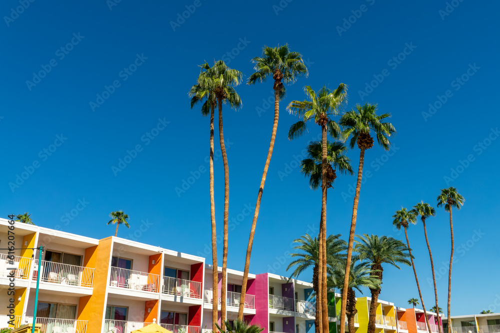 Modern hotel, palm trees and colorful modernist architecture in Palm Springs, California