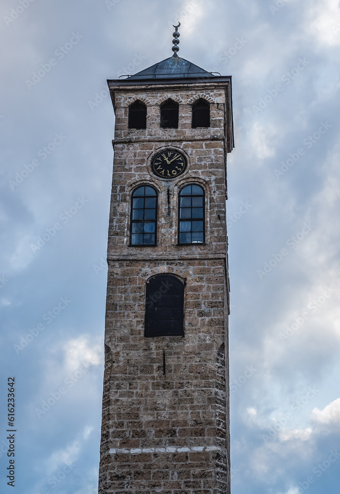 Clock Tower next to Gazi Husrev-beg Mosque in Bascarsija, historic part of Sarajevo city, Bosnia and Herzegovina