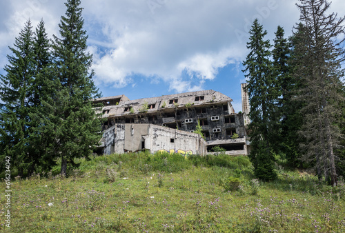 Exterior of Igman Hotel destroyed during Bosnia War near Igman Olympic Jumps, Bosnia and Herzegovina photo