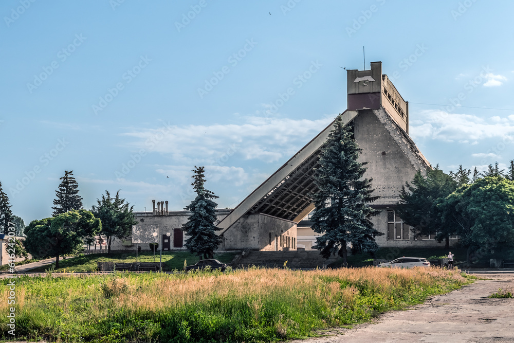 Trostyanets, Sumy Oblast, Ukraine - June 18, 2023: Destroyed building of the railway station Smorodino in Trostianets. Grass and weeds have grown on the city square bombed by russian terrorist troops