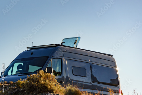 Sunroof, raisable window on roof top of campervan photo