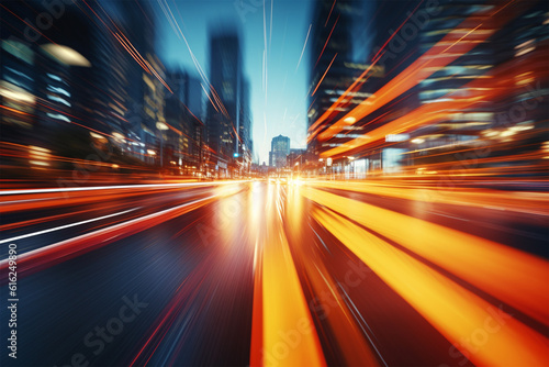 Blurred cars at night, tail lamps and traffic lights, abstract blurry city road
