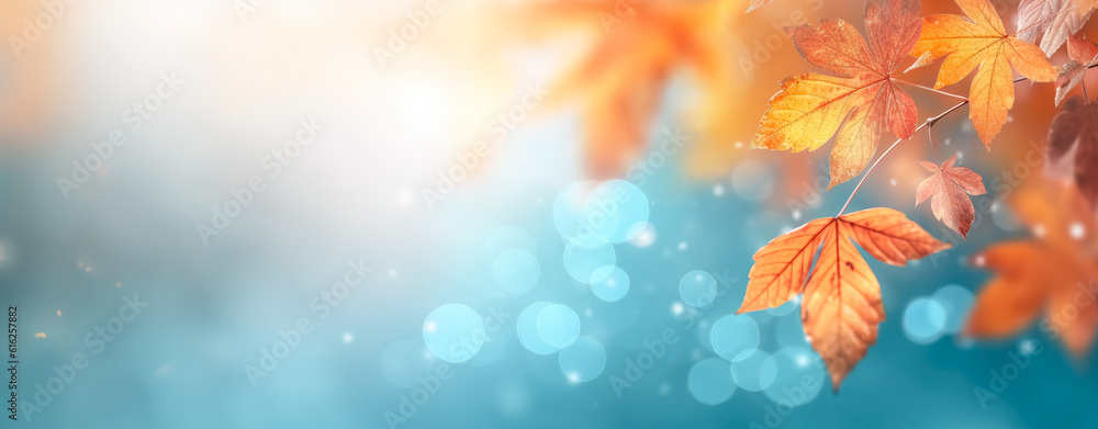 Orange and red autumn leaves with bokeh effects on abstract blue background. Orange and red autumn leaves with bokeh effects on abstract blue background.