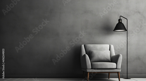 Modern minimalist design against a gray wall. Living room interior. Armchair with a floor lamp against the wall. Modern Scandinavian interior