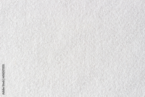 Abstract white color felt textile fabric texture background