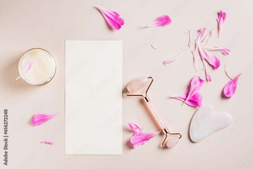 Set of face and neck skin care accessories on a pink background. Roller and gua sha rose quartz, mockup blank. Spa concept. Set of face and neck skin care accessories on a pink background. Roller and gua sha rose quartz, mockup blank. Spa concept.