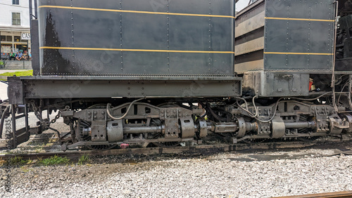 Close Up View of a Antique Shay Steam Locomotive's Running Gears as it's Warming Up For Days Work