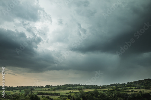 Storm clouds and lightning above the countryside