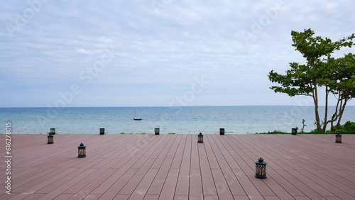 wooden deck by the sea in a tropical resort  © Deneb Cygni