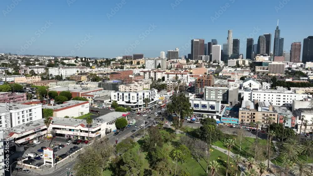 Los Angeles Downtown and Palm Trees from MacArthur Park Aerial Shot Back R in California USA Los Angeles Downtown and Palm Trees from MacArthur Park Aerial Shot Back R in California USA
