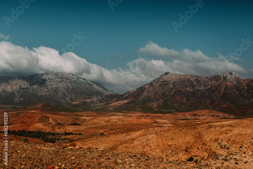 Dramatic mountain landscape under cloudy skies in Socotra, Yemen.
