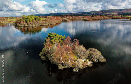 Obraz na płótnie Loch Kinord crannog prehistoric Iron Age artificial manmade island settlement. Muir of Dinnet, Grampian, Scotland. Spring. Aerial view looking east w salonie