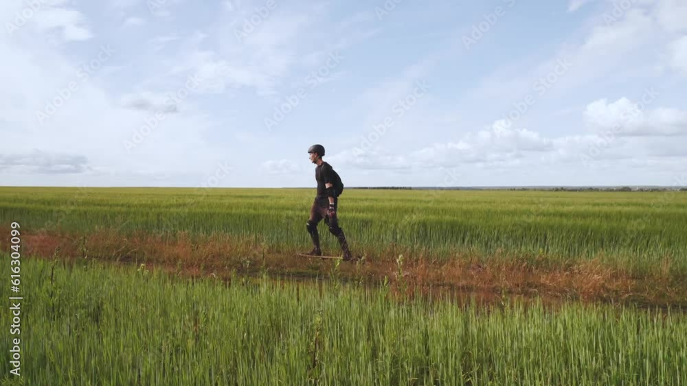Aerial photography of a skateboarder in nature, a man on an electric skateboard, riding an electric skateboard in nature, electric longboard evolve, electric skateboard evolve Aerial photography of a skateboarder in nature, a man on an electric skateboard, riding an electric skateboard in nature, electric longboard evolve, electric skateboard evolve