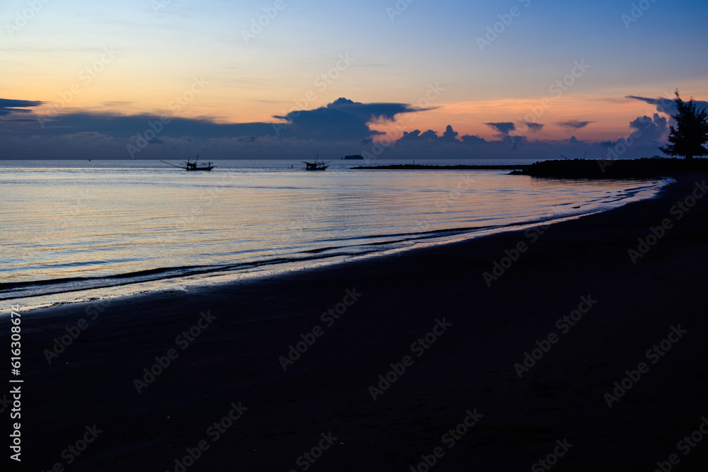 Sunrise landscape with fishing boats and beautiful sea sky,