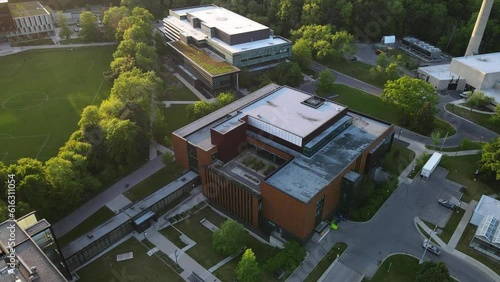 Aerial drone shot of university campus building in Mississauga, Canada. Top-down view of Modern architecture educational building of campus and library in sunlight summer