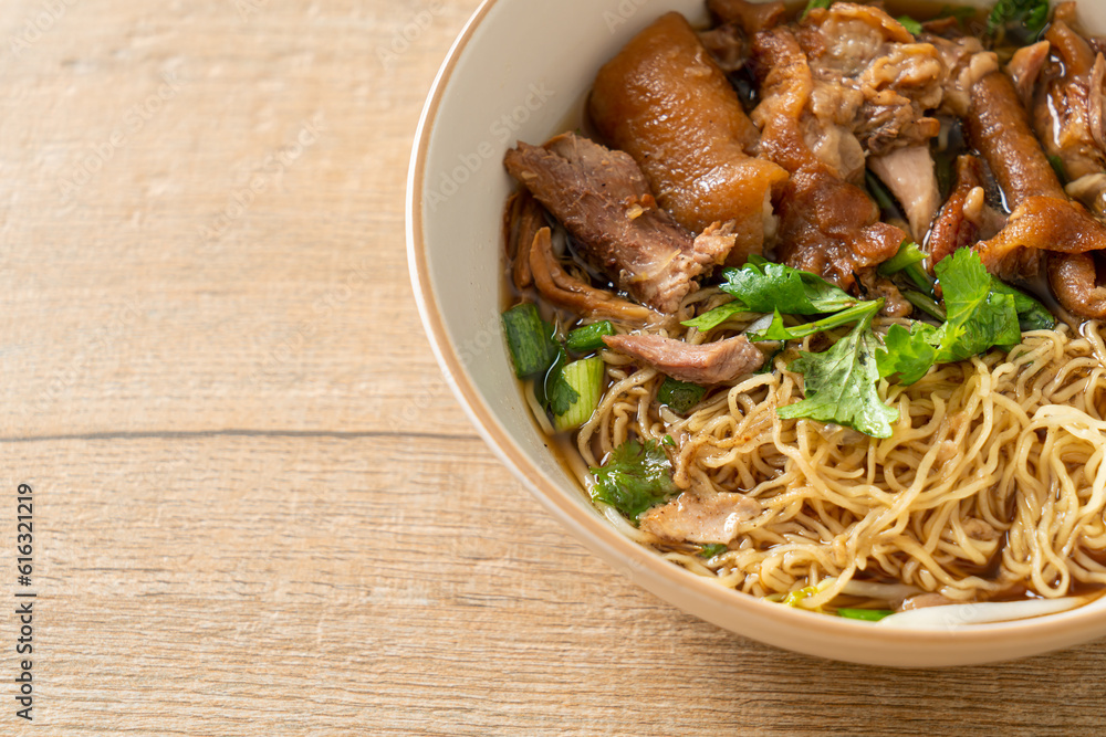 Stewed pork leg noodles in brown soup Stewed pork leg noodles in brown soup