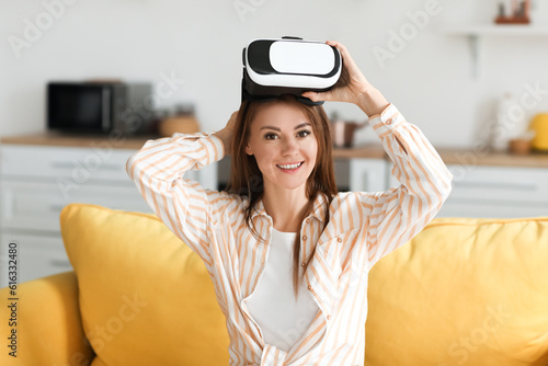 Pretty young woman with VR ...