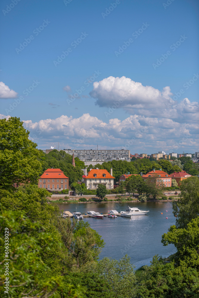 Landscape view, embassies, churches and Swedish Radio at the bay Djurgårdsbrunsviken, a sunny summer morning in Stockholm