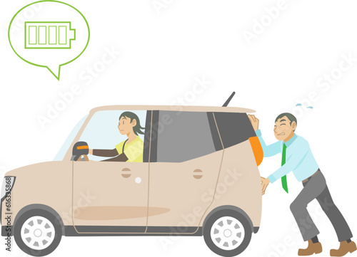 電気自動車を押す男性